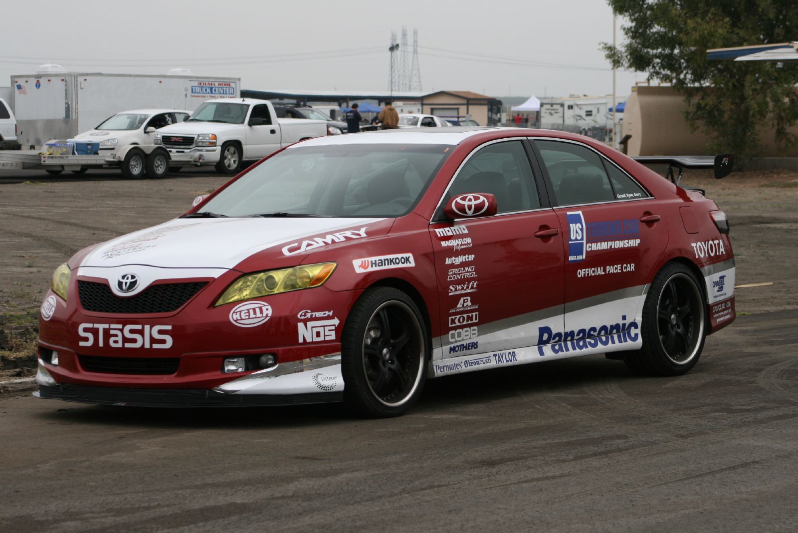 a toyota celica s135i on the road in a race