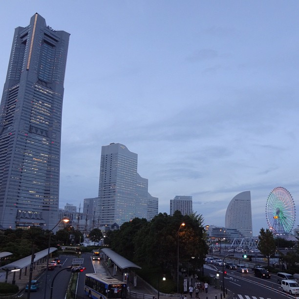 a street in a large city at twilight