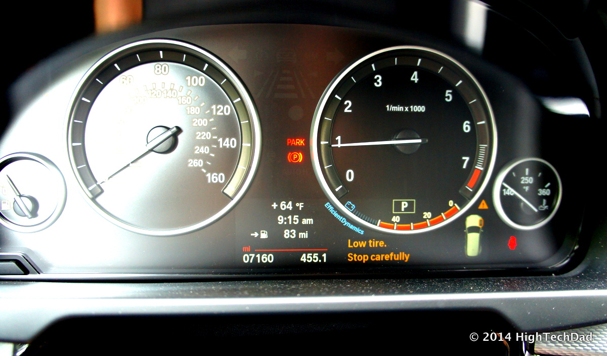there are several gauges on the car's dashboard