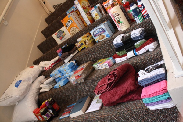 a staircase with many items sitting on it