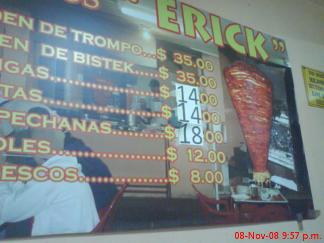 the menu is displayed in front of the restaurant