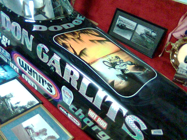 a display of a racing car made out of pictures