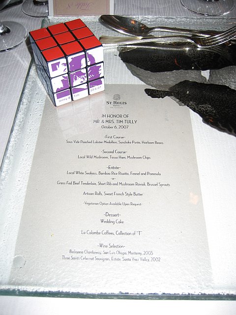 a close up of a menu sitting on a plate