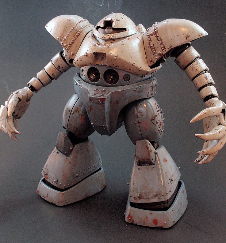 a model of a gray humanoid standing on its hind legs