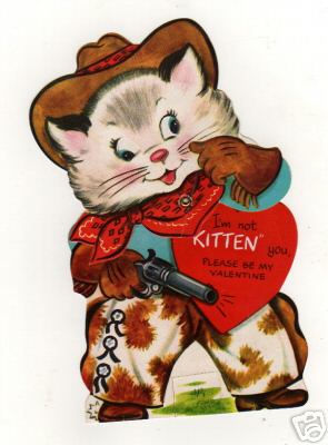 a postcard features a cat holding a heart and wearing a cowboy hat