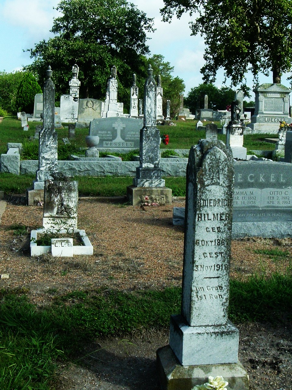 a cemetery has headstones with names on them