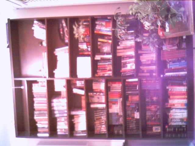 this is an image of a bookshelf filled with books
