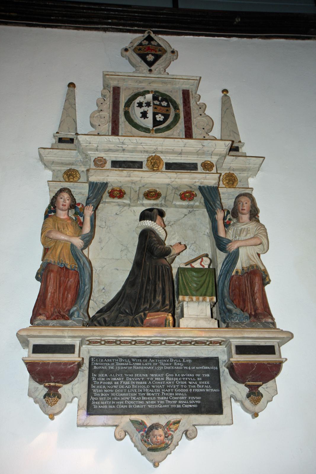 a religious plaque is shown on the wall