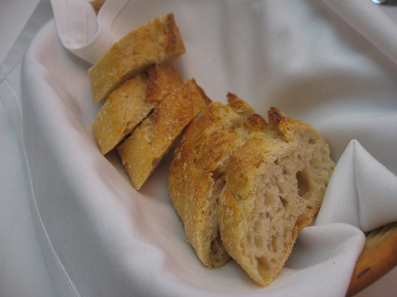 breads with cut up pieces on top of them