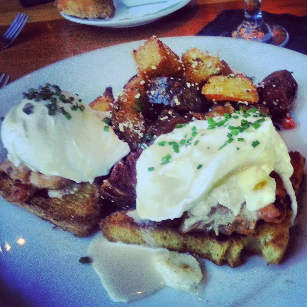 potatoes with parsley cheese and meat on a plate