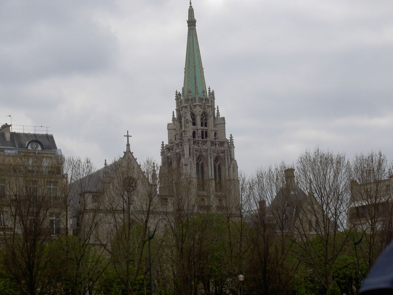 large cathedral towering over several other tall buildings