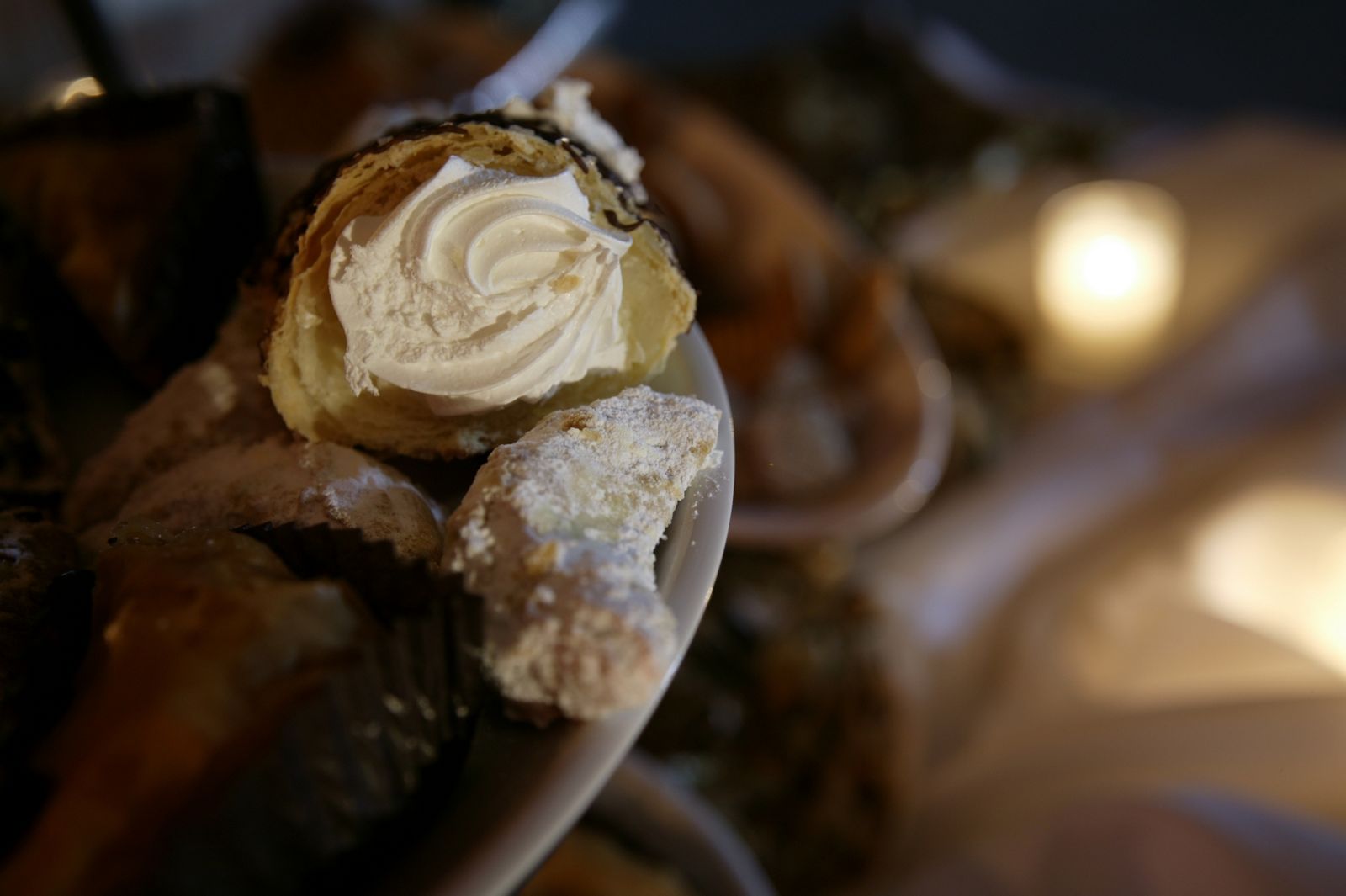 a white plate topped with assorted pastry