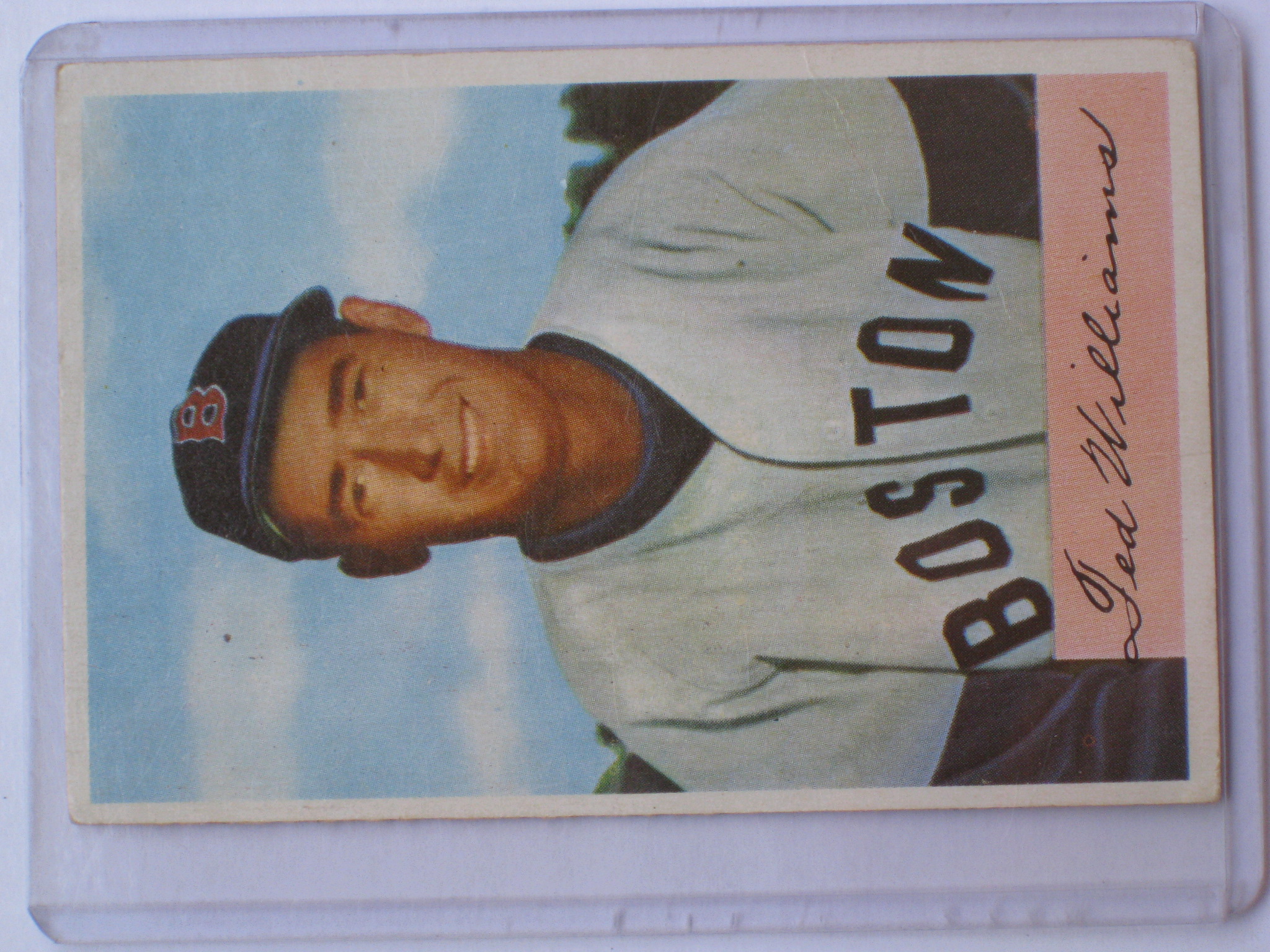 a baseball card with a picture of a player on it