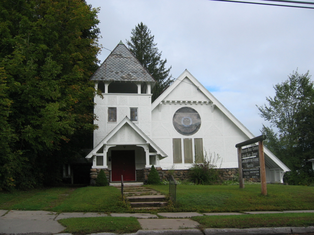 the house with its two stories sits on the corner