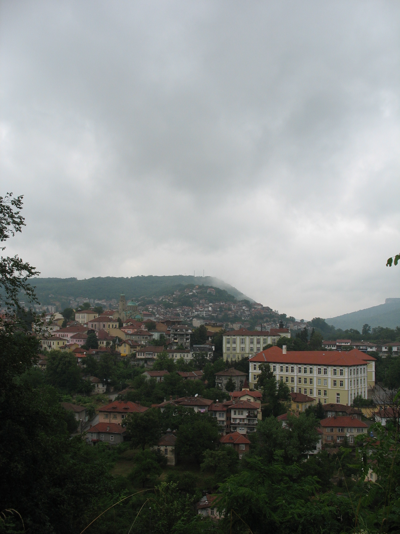 a small town nestled between lush green hills