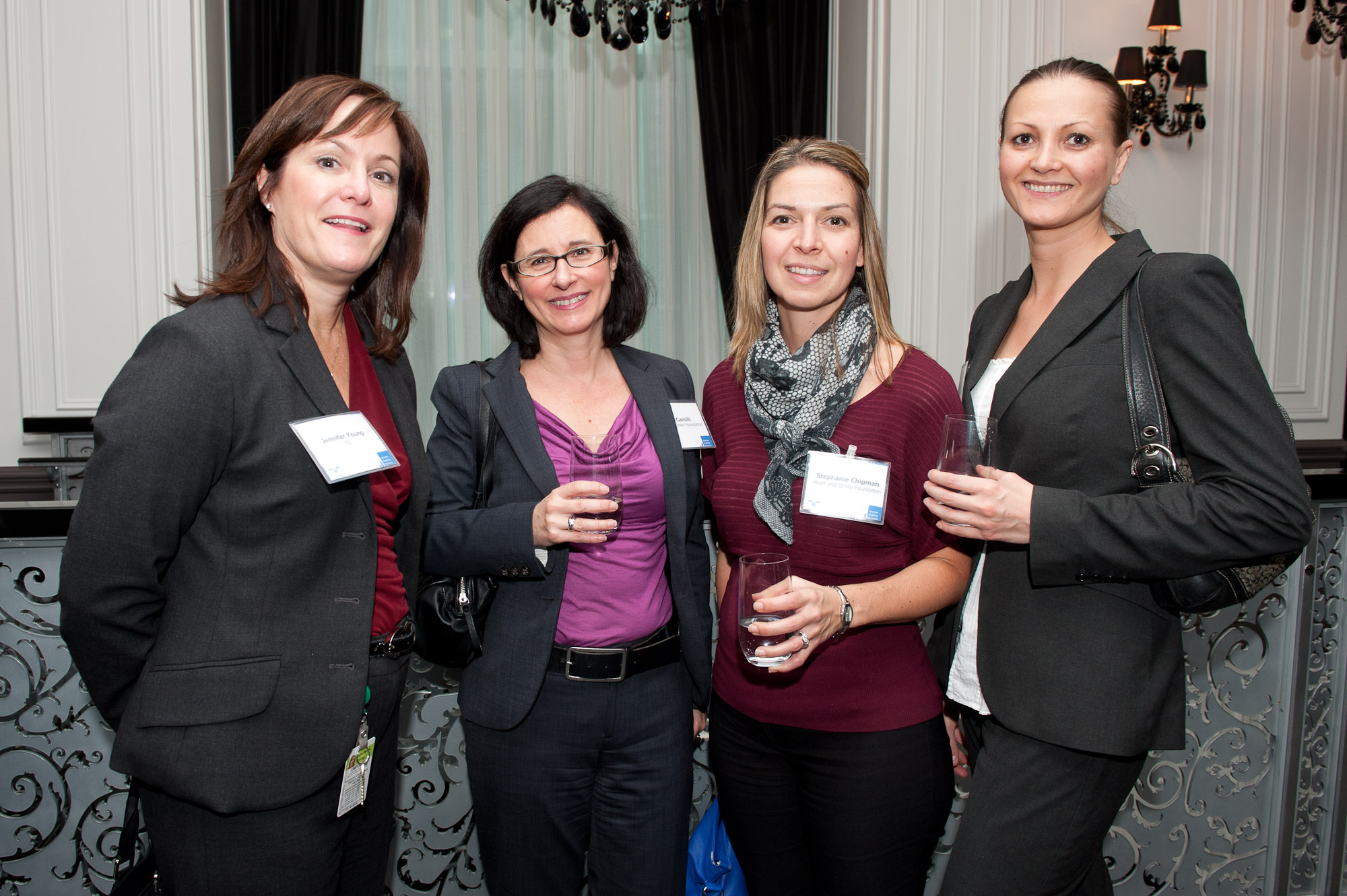 a group of women smiling for the camera