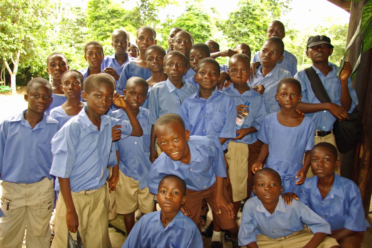 a group of young people pose for a po