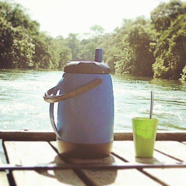 an up close view of a bottle on a picnic table