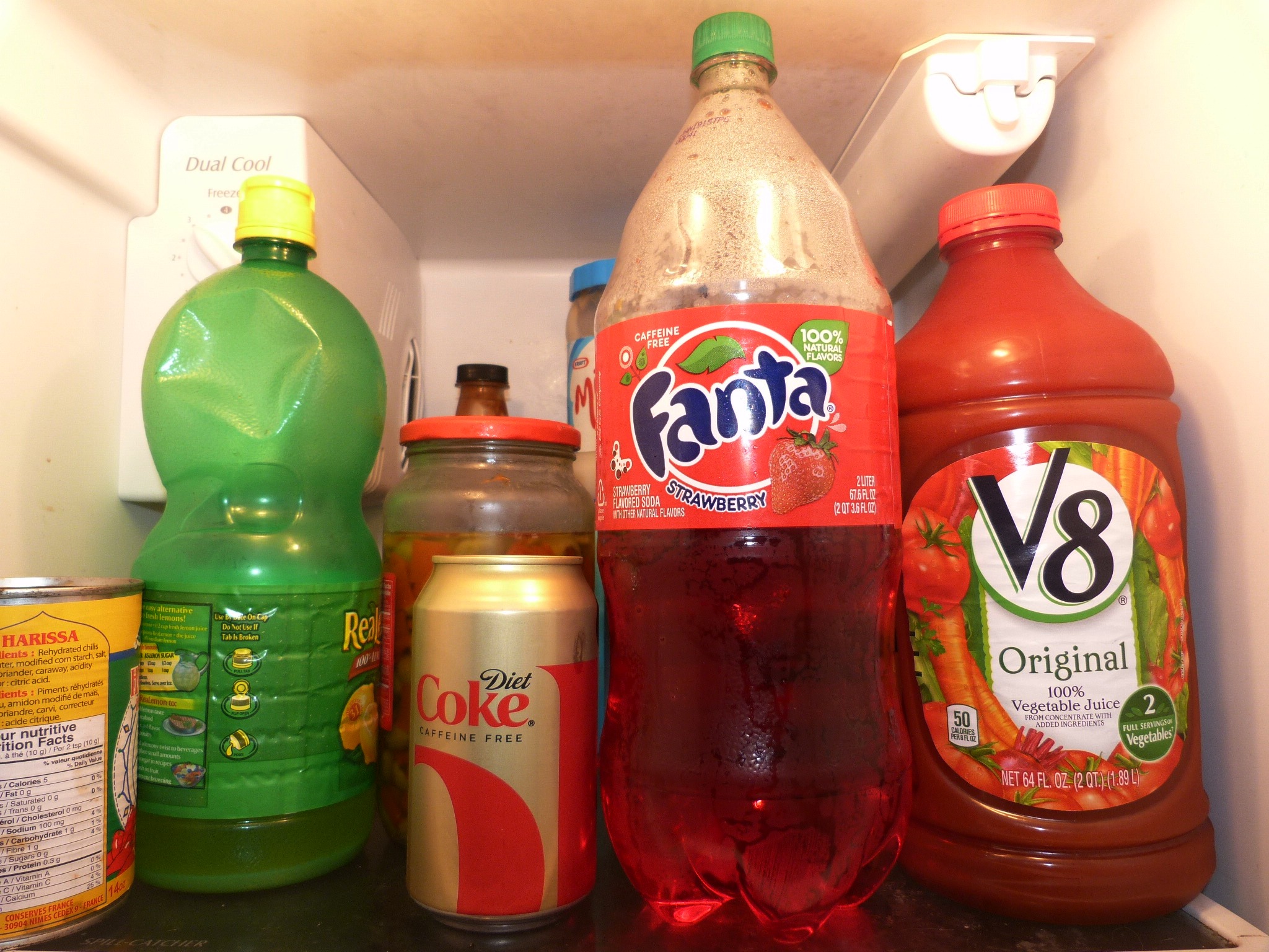 a close up of many different types of soda