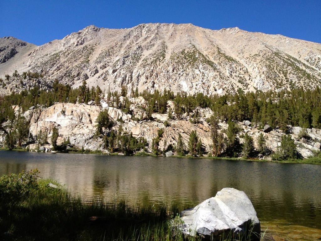 mountain landscape with large lake near the base