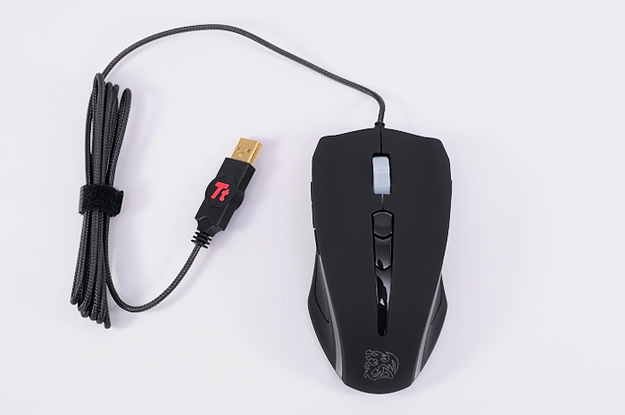 a cord connected to a computer mouse with an additional cable