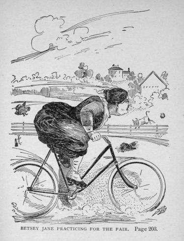 a woman rides her bicycle in the snow while wearing black