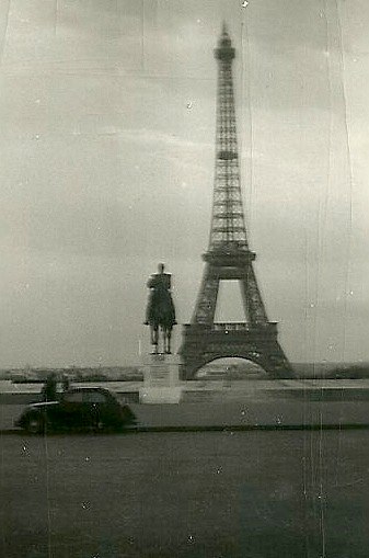 a black and white pograph of the eiffel tower