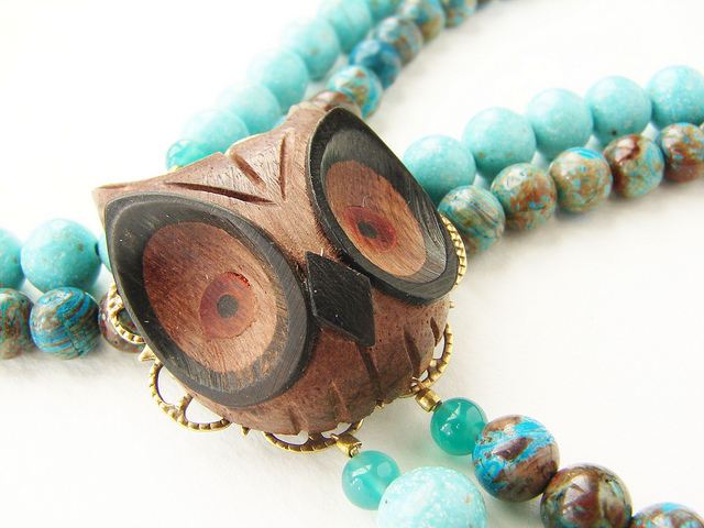 necklace with wooden owl shaped beads with clasp and beads