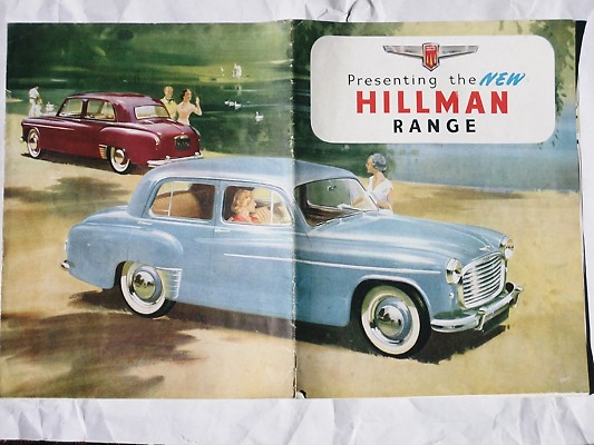 an older car ad features an automobile parked in front of a classic model