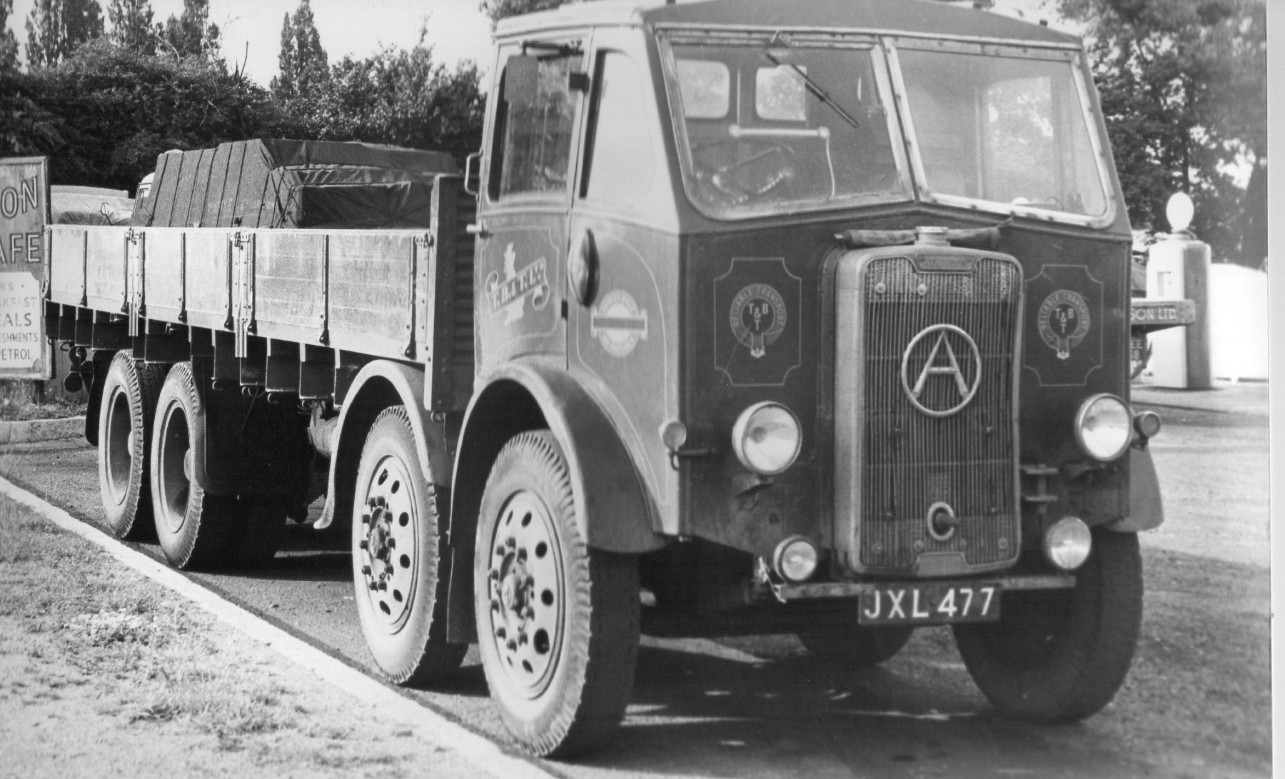 an old po of a transport truck in black and white