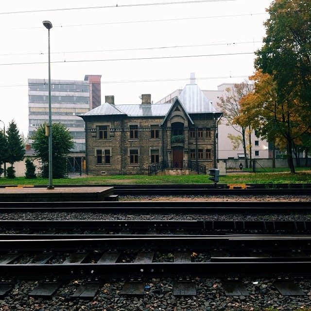 the house is near the railroad tracks in the park