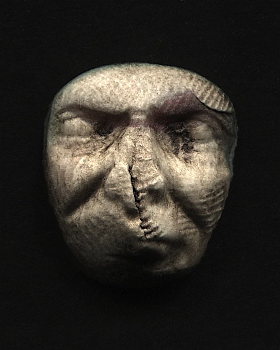 an artwork of the face and mouth of an old man