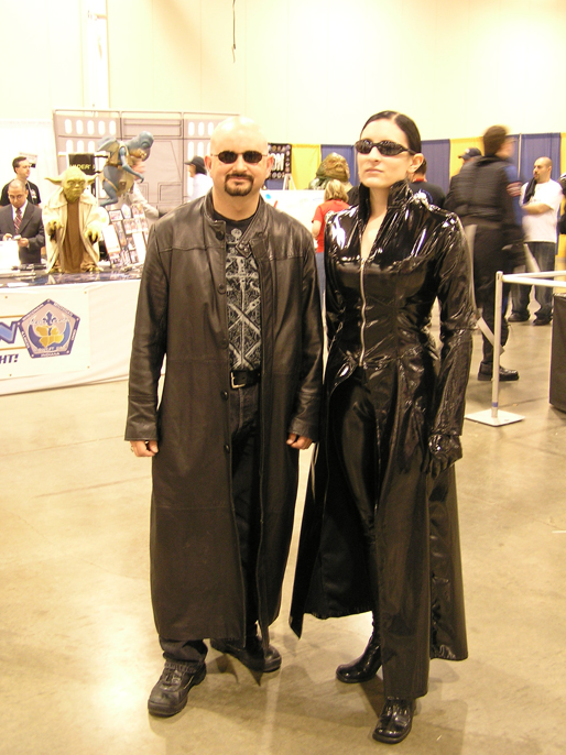 two people in costumes standing next to each other