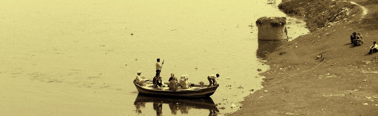 the small boat is at the edge of the bank