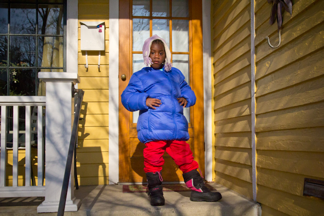 a person standing on a step next to a door