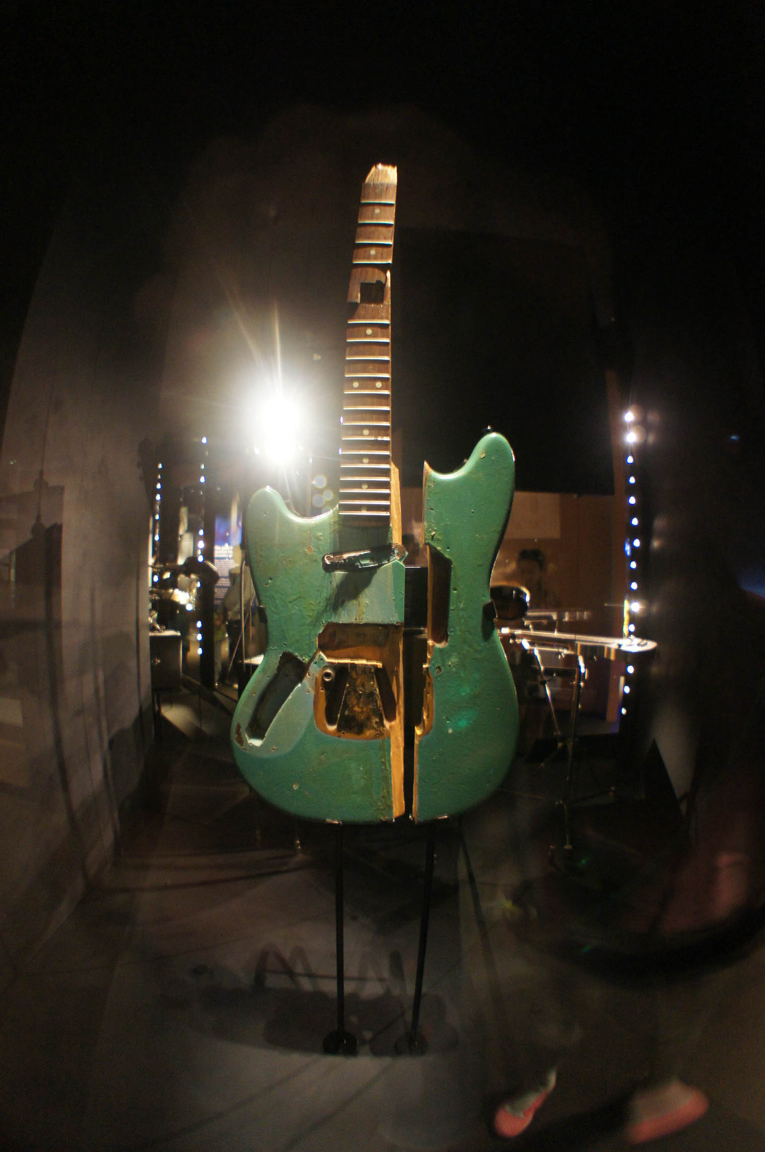 an electric guitar sculpture is on display