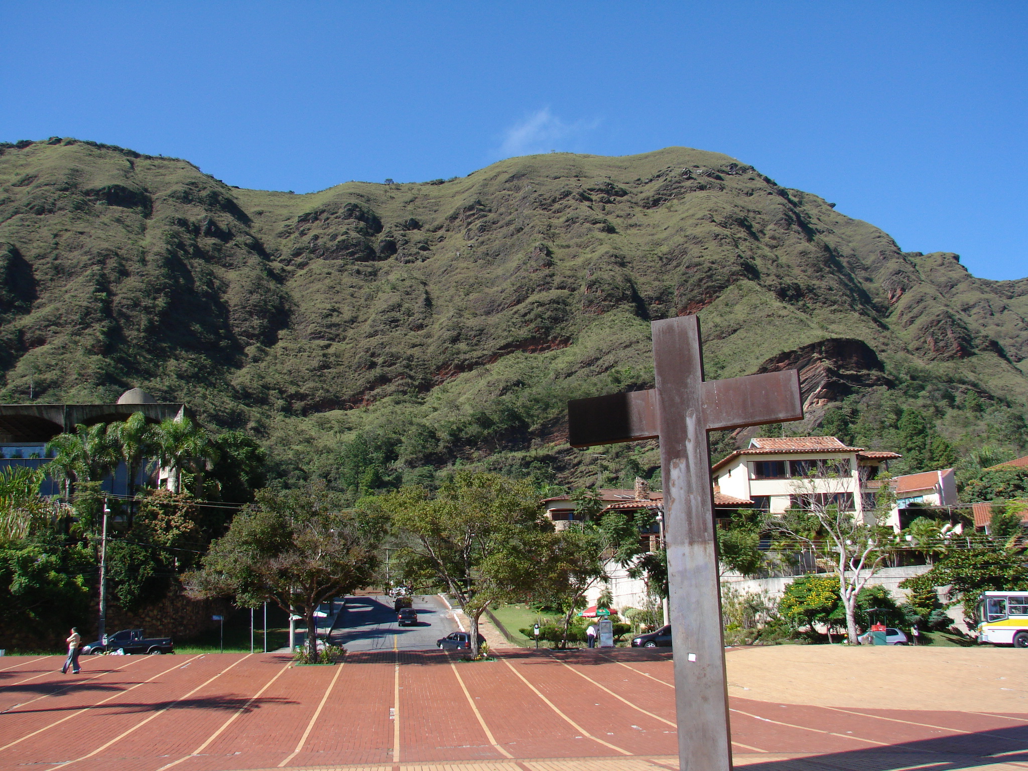 a street light in front of some buildings in a town