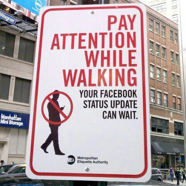 a street sign is showing you don't pay attention while walking