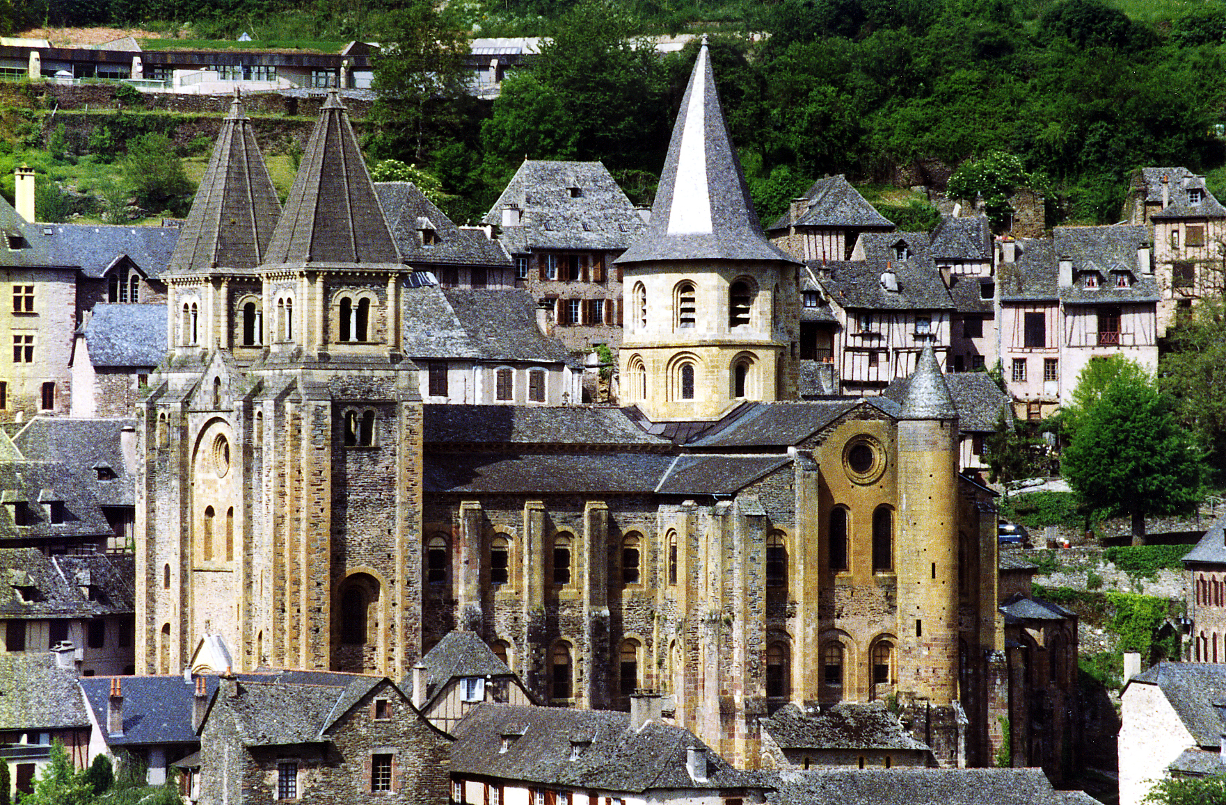 an aerial view of many historic buildings surrounding a hill