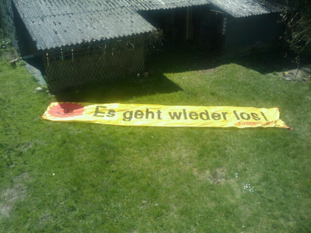 an image of a banner on the ground with someone's name written on it