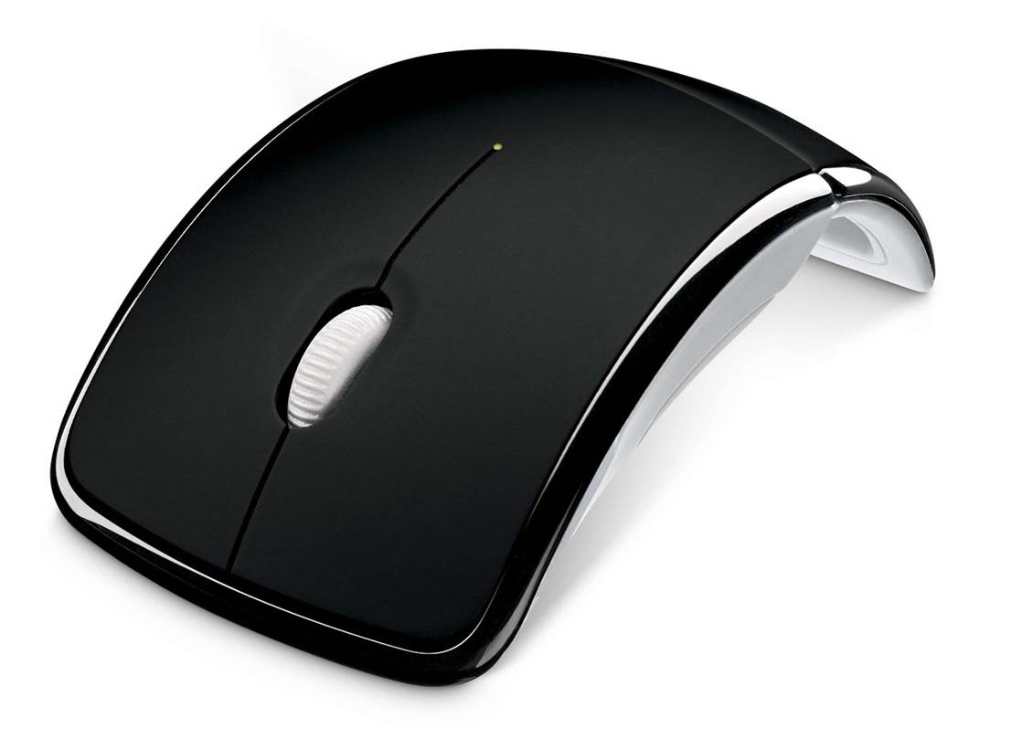 the black mouse is attached to a white surface