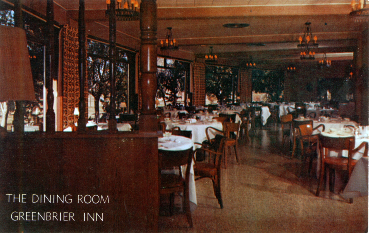 a restaurant with tables and chairs set for dinner