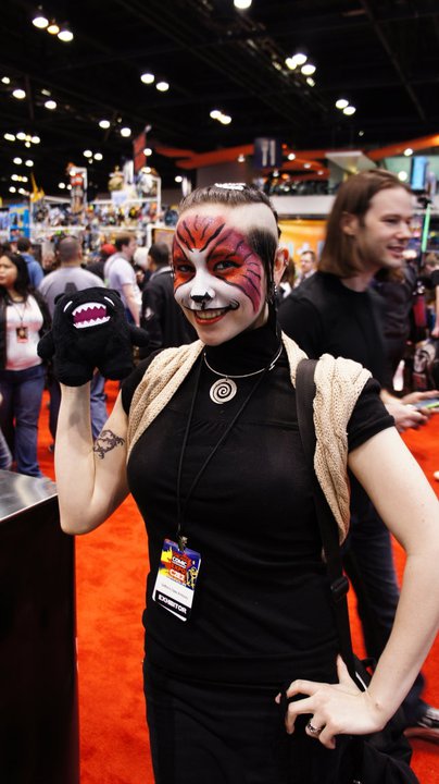 a woman with a fake teeth in a convention