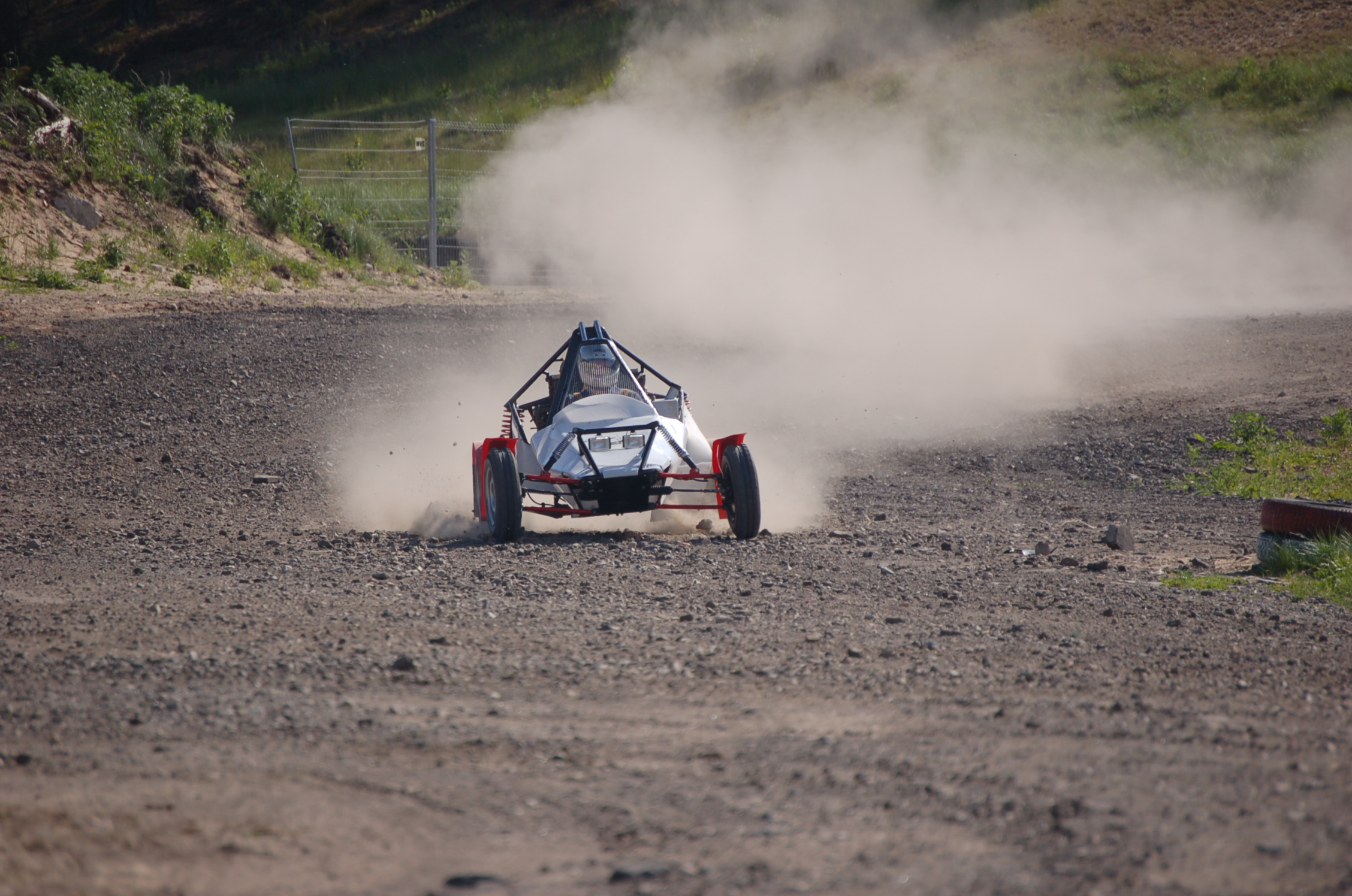 there is a buggy going around the track