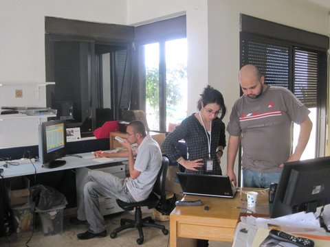 a group of people in an office setting