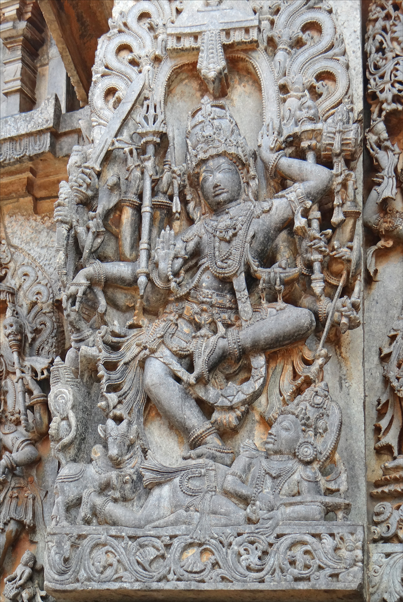 a relief in grey stone depicting a god