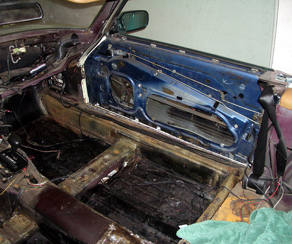 an old car interior with lots of electronics and parts