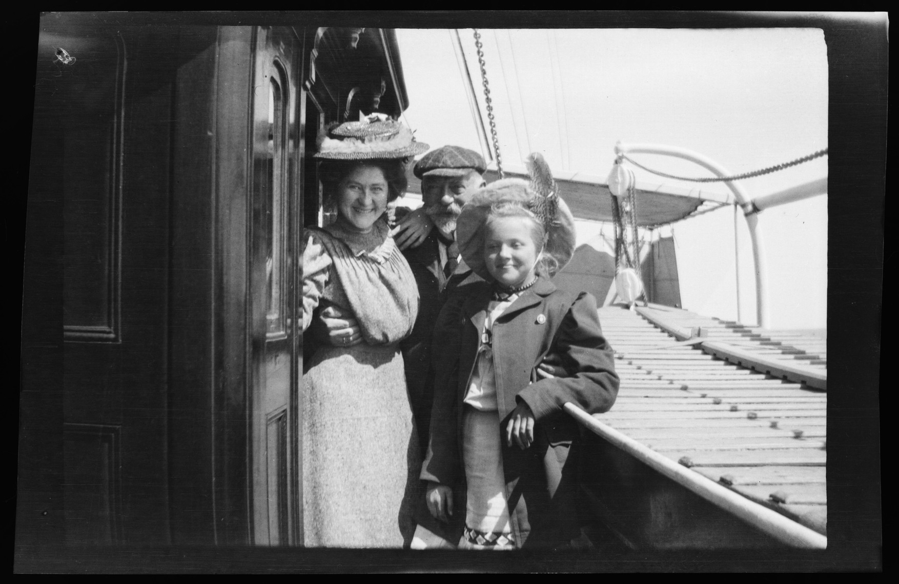 an old po of a family posing for the camera