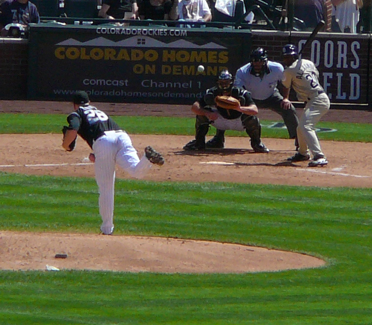 a pitcher has just taken the pitch at a baseball game