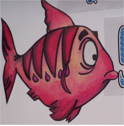 a drawing of a pink fish with big eyes